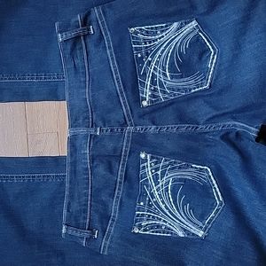 Christopher & Banks straight leg blue jeans with details on pockets and buttons